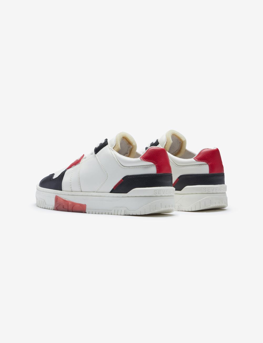 711 white red low-top sneaker