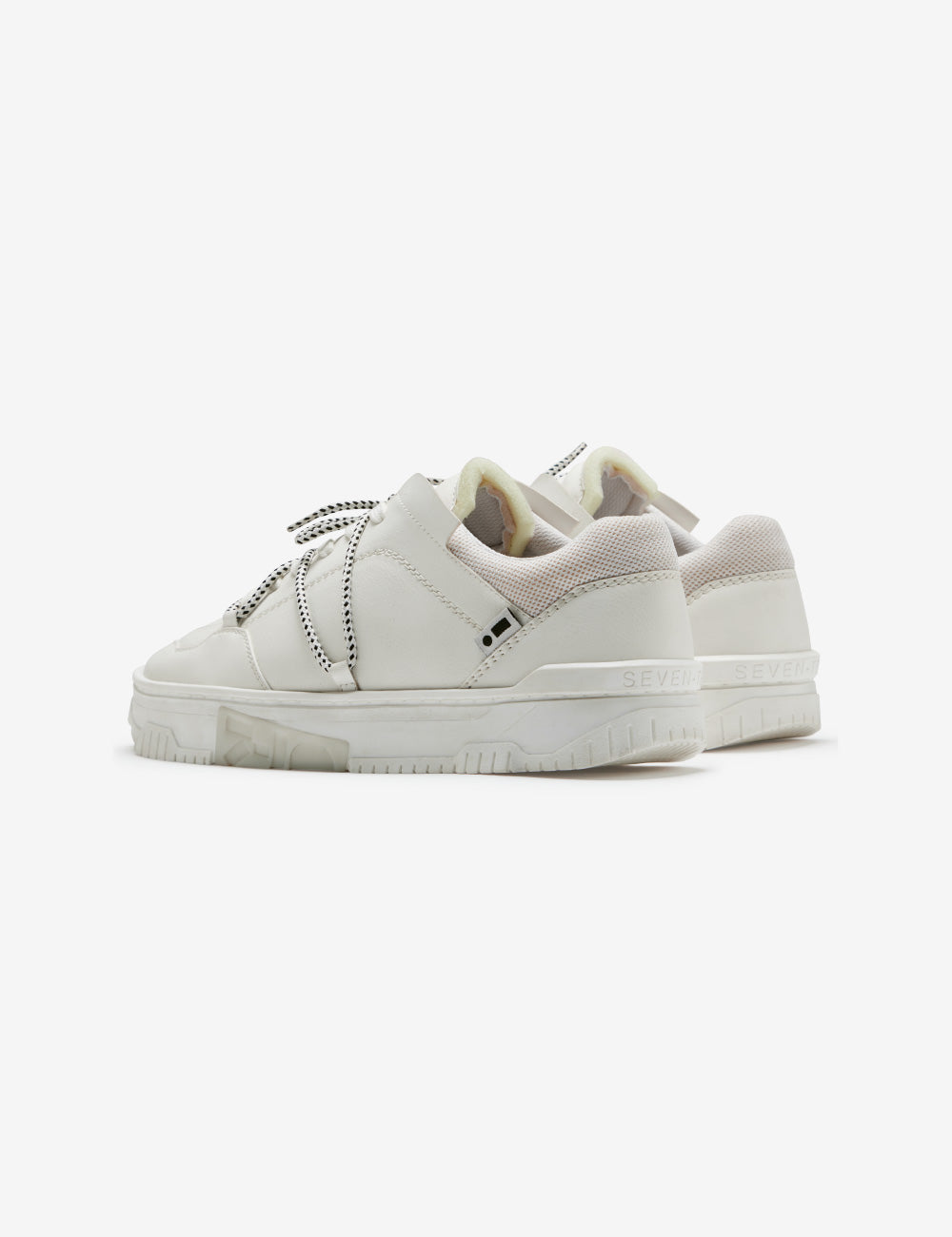 702 triple white low top sneaker