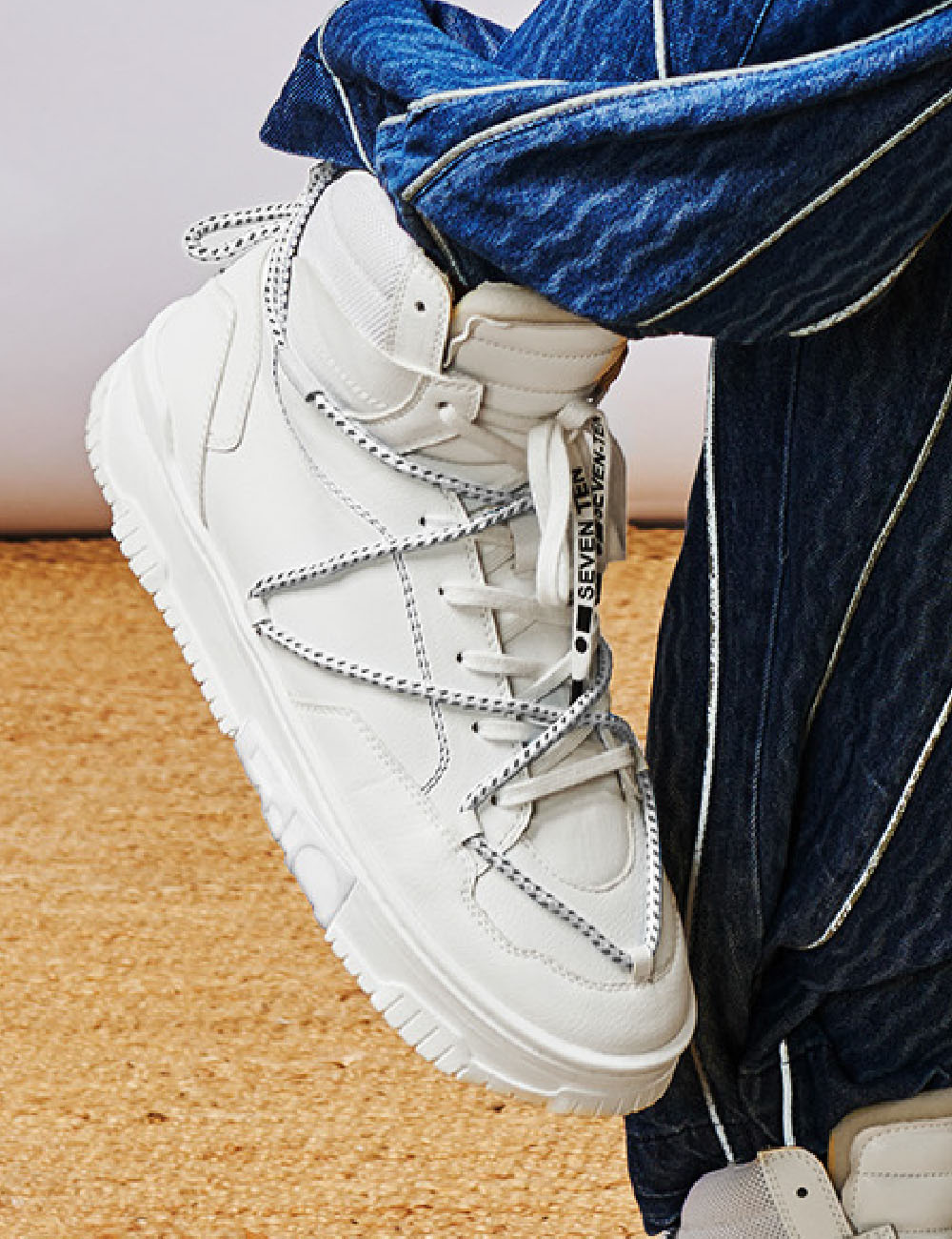 703 triple white hightop sneaker