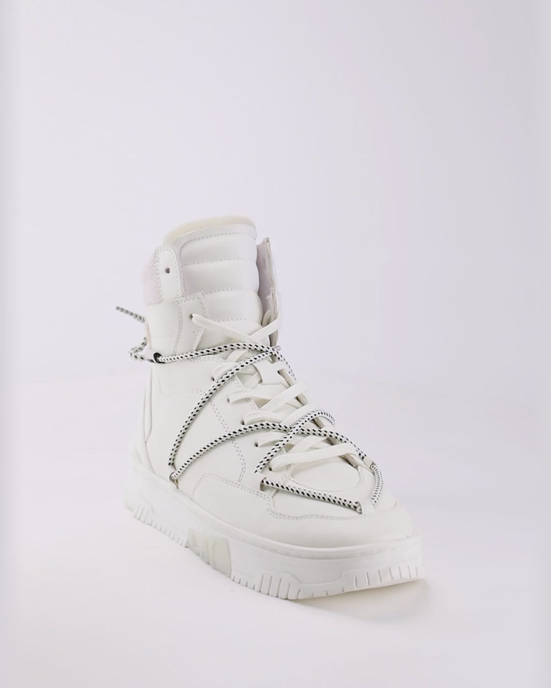 703 triple white hightop sneaker