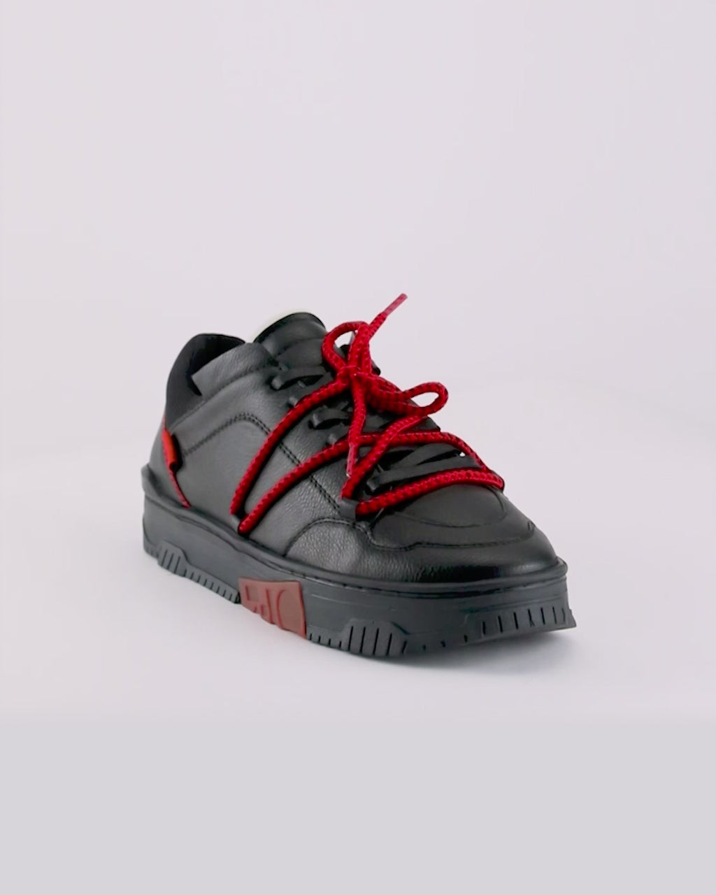 702 black & red low-top sneaker